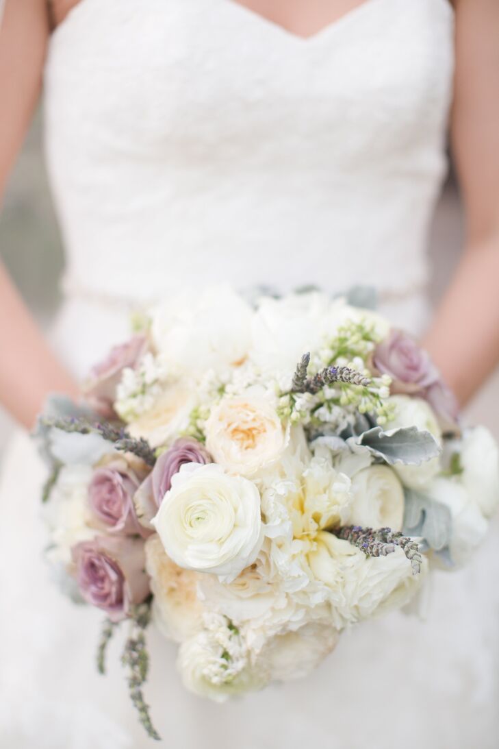 Kathleen’s bouquet had an utterly romantic feel, filled with soft shades of sage, cream, blush and dusty purple. “For my bouquet, I wanted to have mostly white and just soft pops of color,” says Kathleen. The florists at Pelal Pusher delivered, creating a stunning arrangement of garden roses, lavender, lilac, stock, ranunculuses and dusty miller.