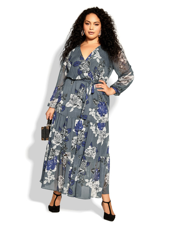 A model wears this grey-white-navy floral wedding guest dress.