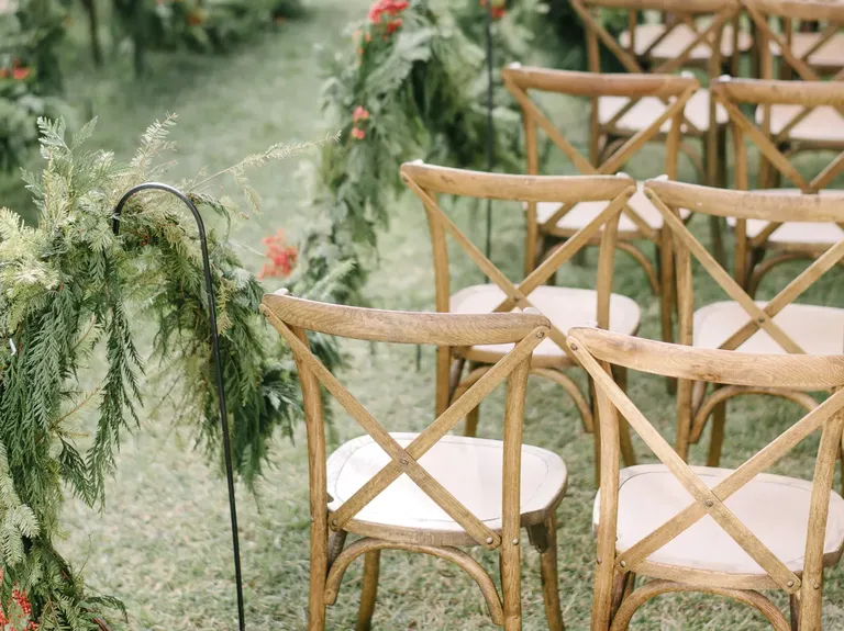 Winter Garland Lined the Aisle for a Winter Wedding Ceremony