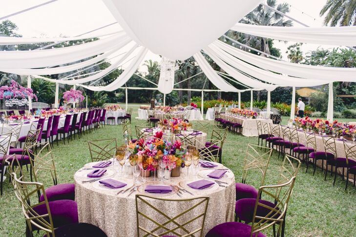 Dinner took place under a tent-like structure of white linens that was open enough to see the stars. The grass was left exposed for a fuss-free splash of natural color.