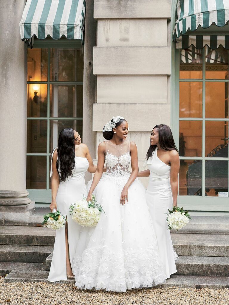 Bridesmaids in long white dresses