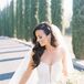 Bride With Long Wavy Curls and Veil