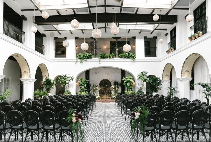 Edgy geometric accents lent Elizabeth Anderson and Adam Rennie’s elegant, old-world-inspired wedding at the Ebell Club Long Beach a major punch of per