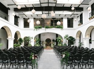Edgy geometric accents lent Elizabeth Anderson and Adam Rennie’s elegant, old-world-inspired wedding at the Ebell Club Long Beach a major punch of per