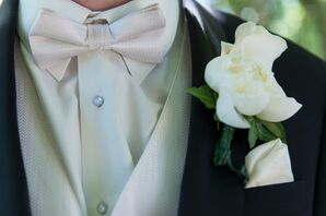 Groom Wearing Vest, Tie and Boutonniere