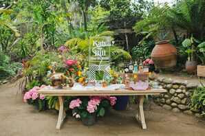 Welcome Bar With Tropical Flowers, Liquor and a Personalized Ice Luge at Lush Reception