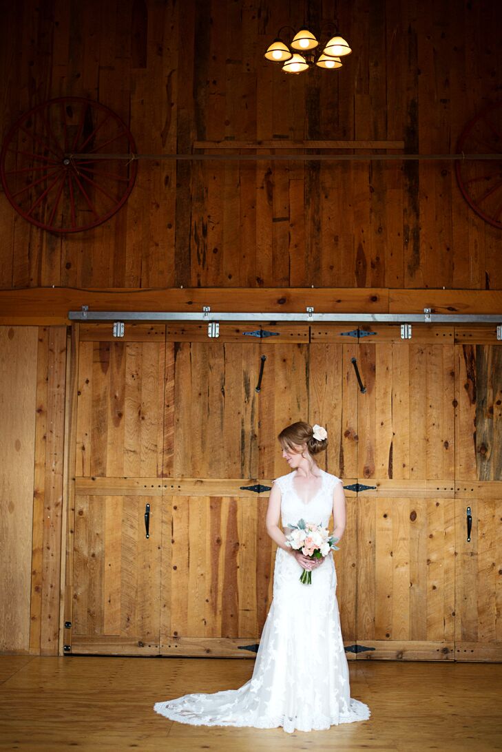 Sara wore a fit and flare, lace wedding dress with cap sleeves. She chose the dress after realizing how comfortable she felt in it. "It felt like wearing pajamas and being a beautiful gown was a definite bonus," Sara says.