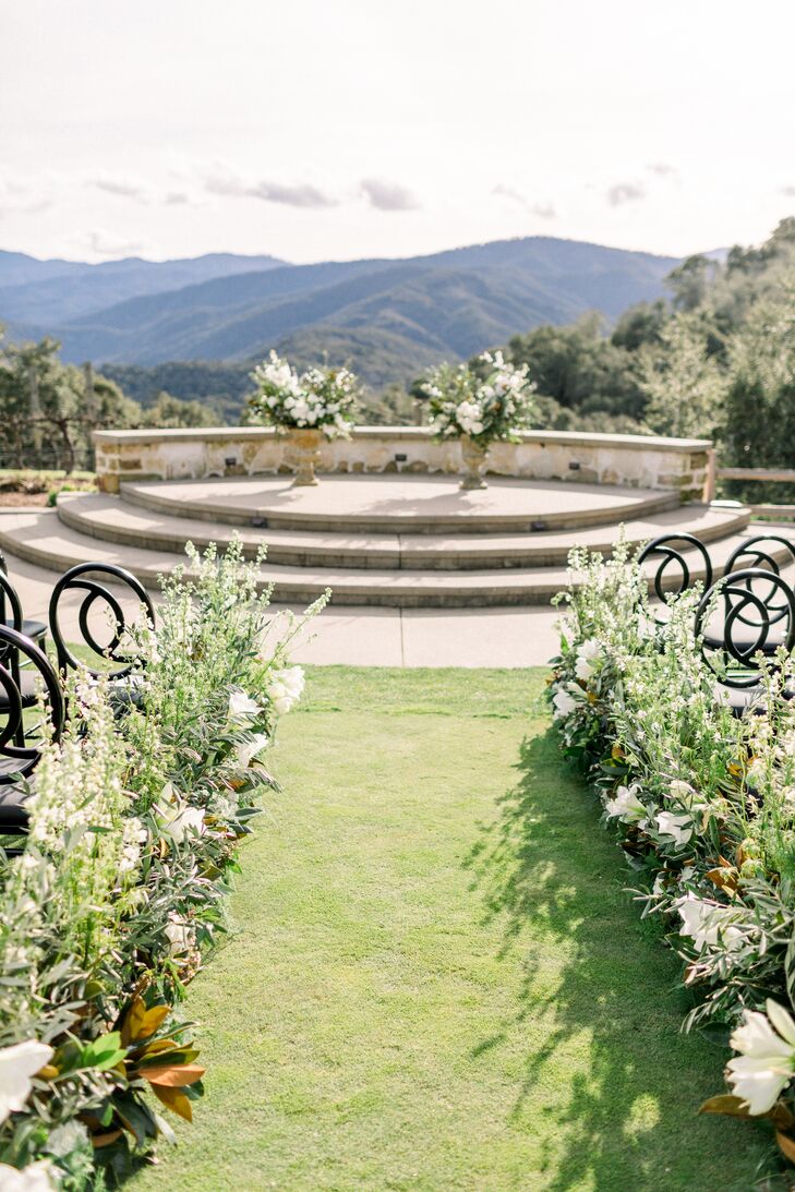 Ceremony Site with Flower Arrangements and Mountain View
