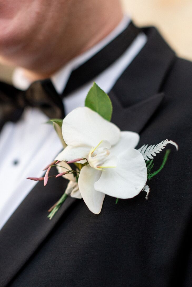 Classic White Orchid Boutonniere