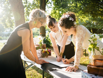 Couple signing marriage license