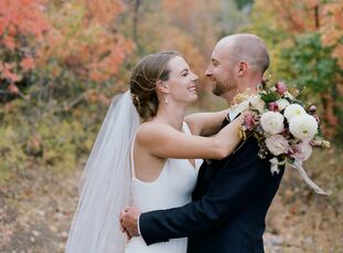 Lane and John tied the knot at Blue Sky Ranch in Wanship, Utah, with just 30 loved ones (and their pup!) in attendance at the intimate fall wedding. V
