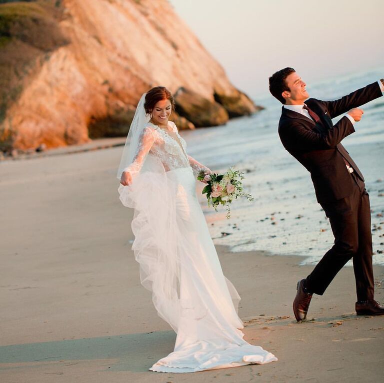 Alex Morgan and Servando Carrasco's wedding photo on the beach