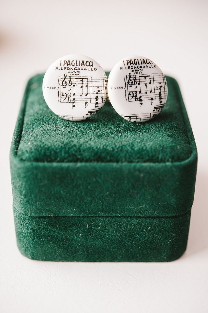 Cameron wore vintage cufflinks with a music score design.