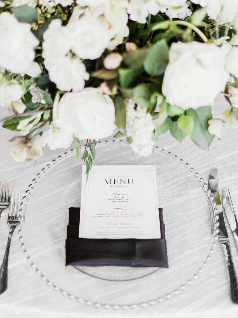 A crisp and modern white table setting.