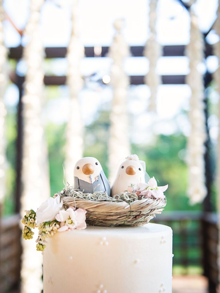 Two hand painted birds as animal cake toppers. 