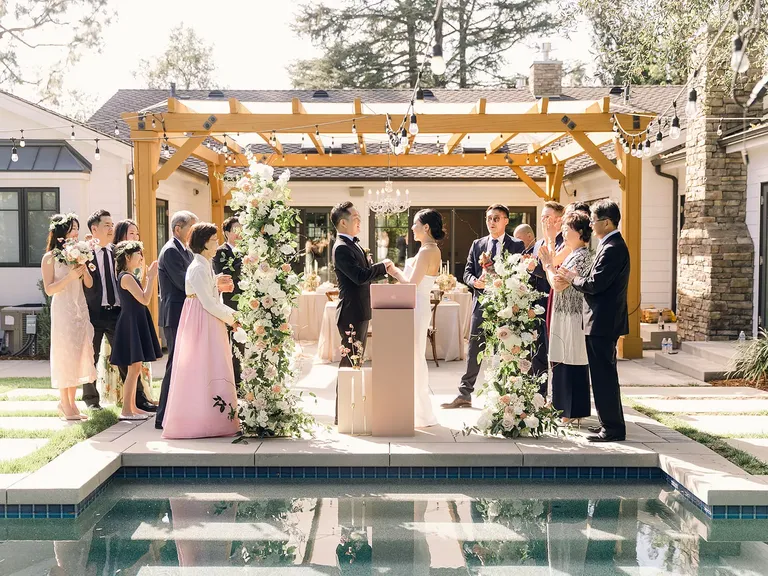 Poolside Backyard Wedding Ceremony Idea