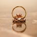 Candace’s engagement and wedding bands were both chic! She paired her cushion-cut ring and its rose gold band with an infinity wedding ring. Conner wore a classic, matching gold ring.