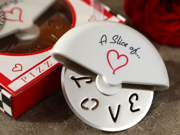 Cute pizza cutter featuring hearts and the word "Love" printed into the blade. 