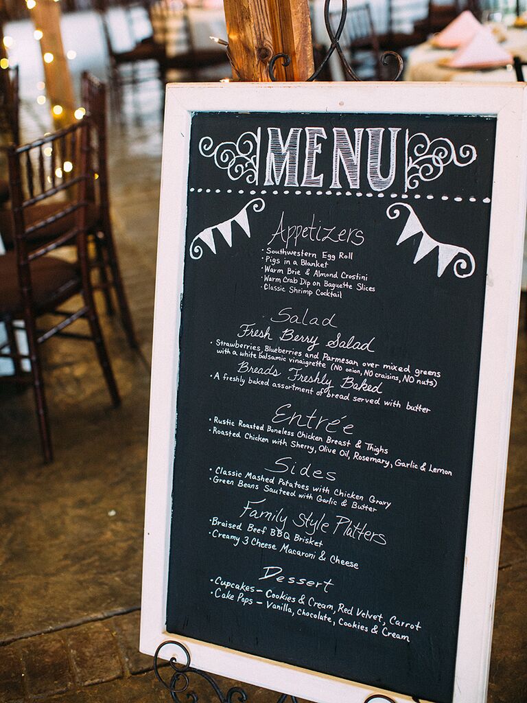 Wedding chalkboard sign with hand-lettered dinner menu