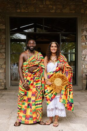 Groom and Bride in Traditional, Colorful Ghanaian Garb for Multicultural Wedding