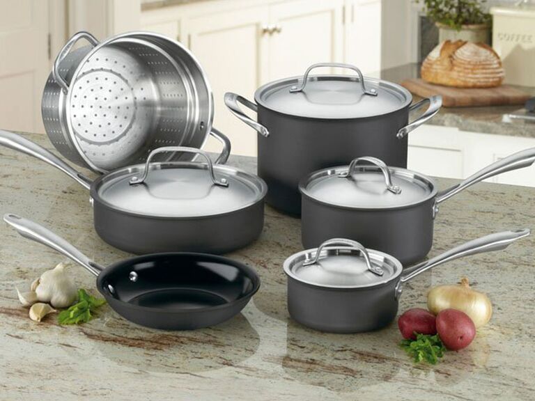 silver and gray Cuisinart cookware set sitting on counter