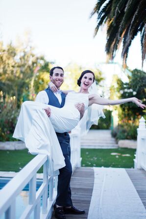 Groom Sweeps the Bride Off her Feet