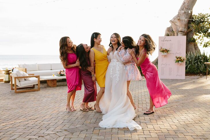 Bride Surrounded By Girlfriends in Bright Dresses a Cocktail Hour
