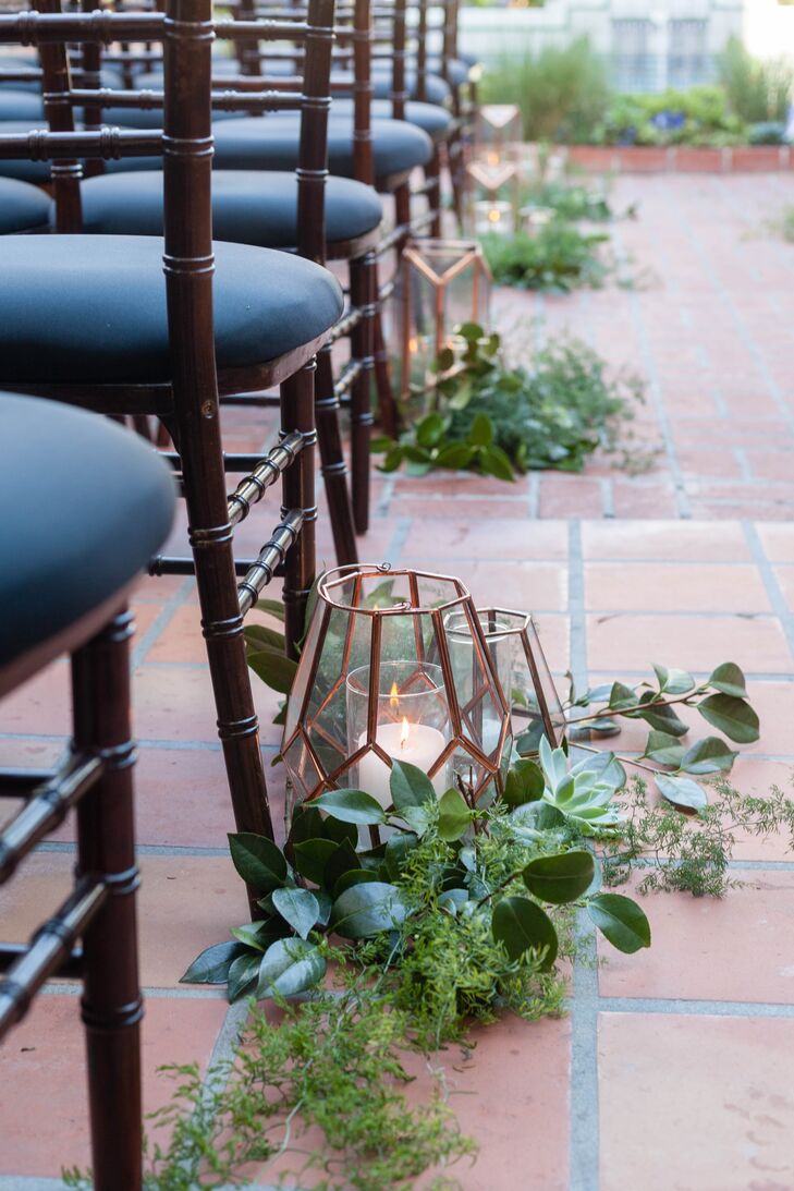 Copper Geometric Lanterns Wrapped in Greenery