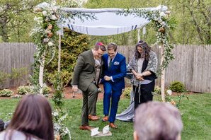 Couple Breaking the Glass During Jewish Backyard Wedding in Winnetka, Illinois