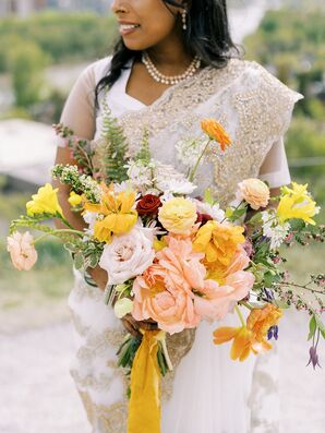 Bride Holding Bouquet With Coral Charm Peonies