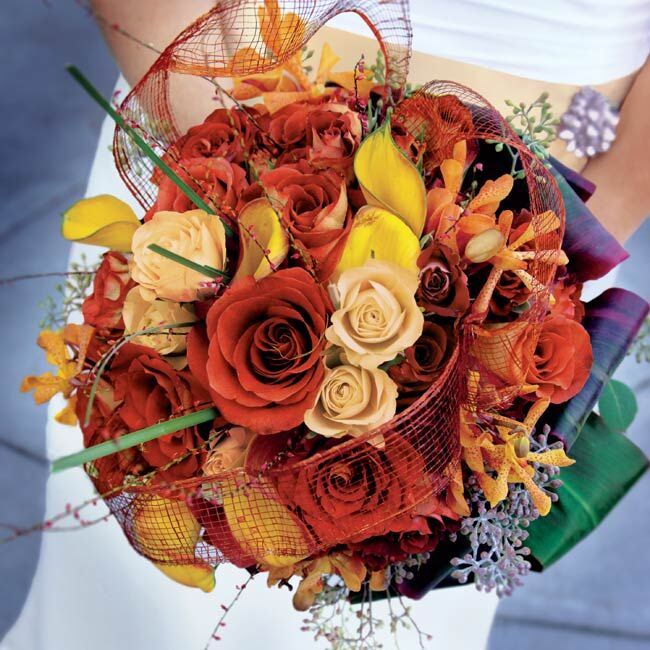 Emily's bouquet of gold and guava-colored roses, orchids, and calla lilies was traditional but with a wild side.