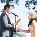 Couple Saying Vows at Outdoor Ceremony