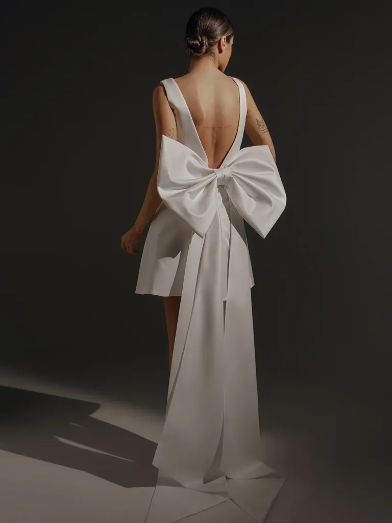 Short satin wedding dress with huge bow for older brides