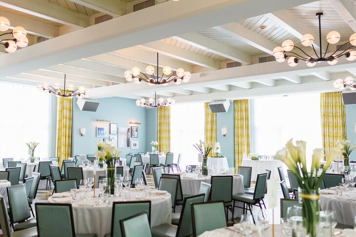 "Our official colors were white, mustard and gray," Wes says. "We used these colors on all our invitations, thank-you cards and signs. Our florist also wrapped each centerpiece in gray and mustard ribbon."