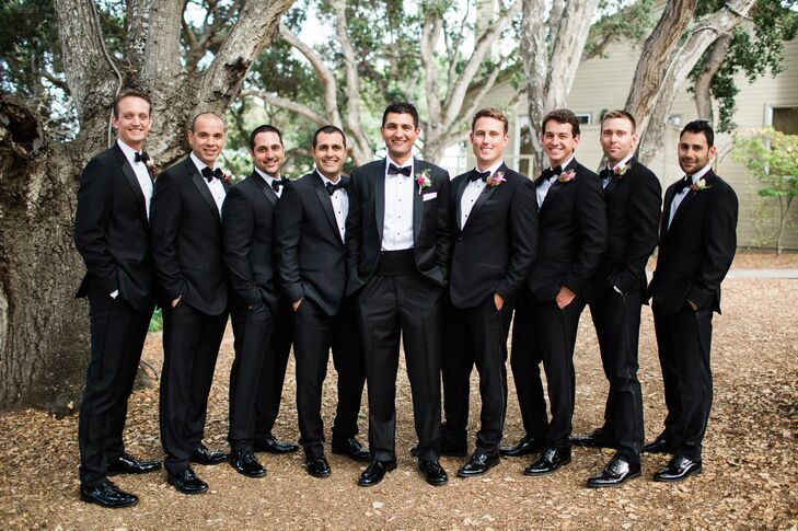 In keeping with the day's elegant aesthetic, Pierre wore a bespoke black tux created by Fitwel Custom Clothes with a shawl collar and cummerbund. Pierre's groomsmen mirrored his polished look with their own black tuxedos, which they obtained via Web-based company Black Tux.