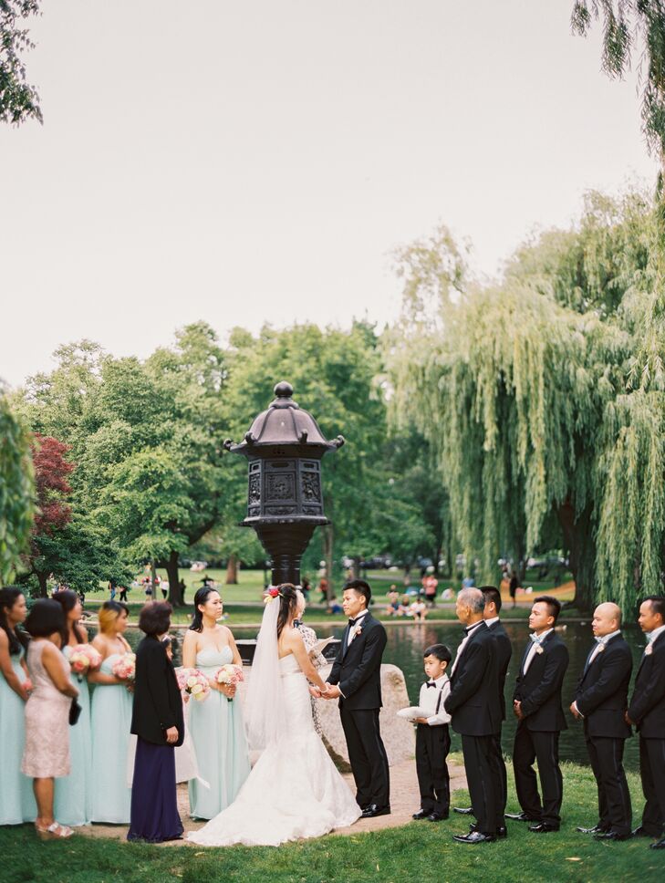 LeiLei and Lanay had two wedding ceremonies, one traditional and the other Western. The morning of the wedding, they hosted a traditional tea ceremony at home with their families, with a Western ceremony taking place later in the day at the Boston Public Garden’s Japanese lantern site.