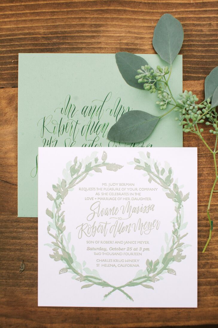 Olive branches and leaves were present throughout Sloane and Robert's wedding day -- in Sloane's floral crown, and all of her floral arrangements as well as on all of her paper goods, including the invitation suite. Sloane says she was inspired by the landscape of the winery.