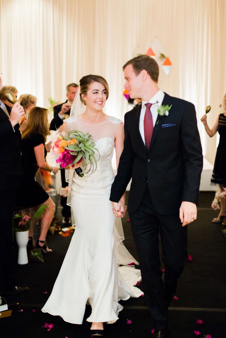 Kelly and Adam recessed down the aisle to "All Day and All of the Night" by the Kinks.