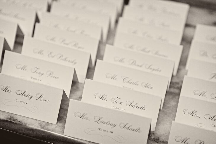 The tented escort cards mimicked the elegant design of the wedding invitations.