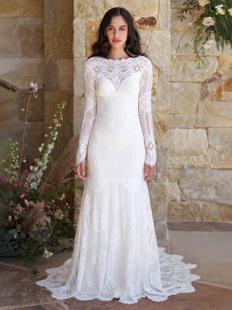 claire pettibone white boho wedding dress with lace long sleeves sweetheart neckline with lace high neck and lace flowy pleated skirt