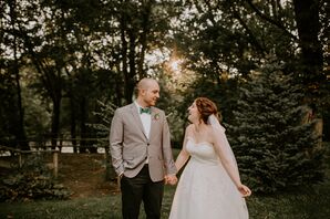 Bride in Classic Lace Gown and Groom in Grey Blazer with Green Bow Tie