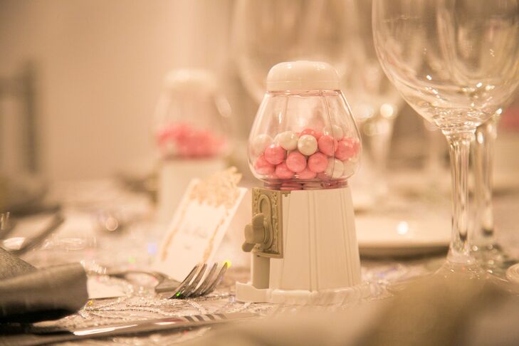 "As guests sat down to the reception there was a mini bubble gum machine with wedding-colored gum inside," says Kelli