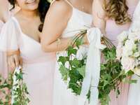 bridesmaids holding ivy wedding bouquet alternatives