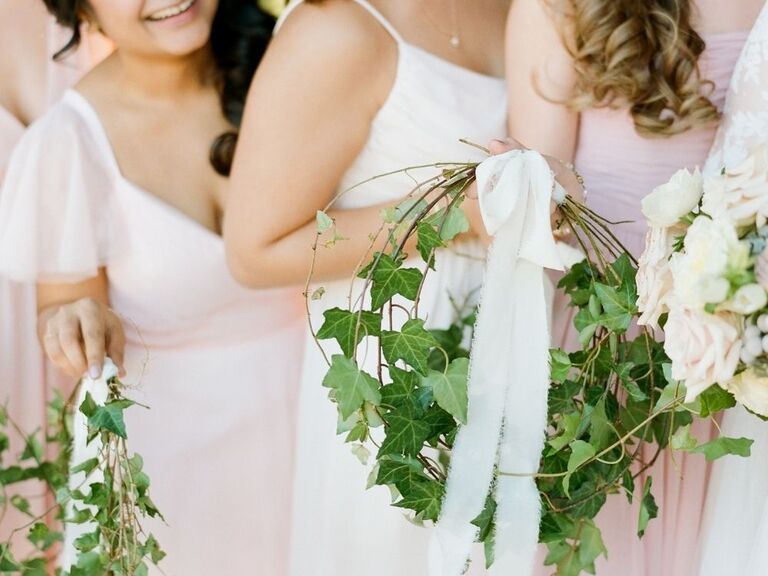 bridesmaids holding ivy wedding bouquet alternatives