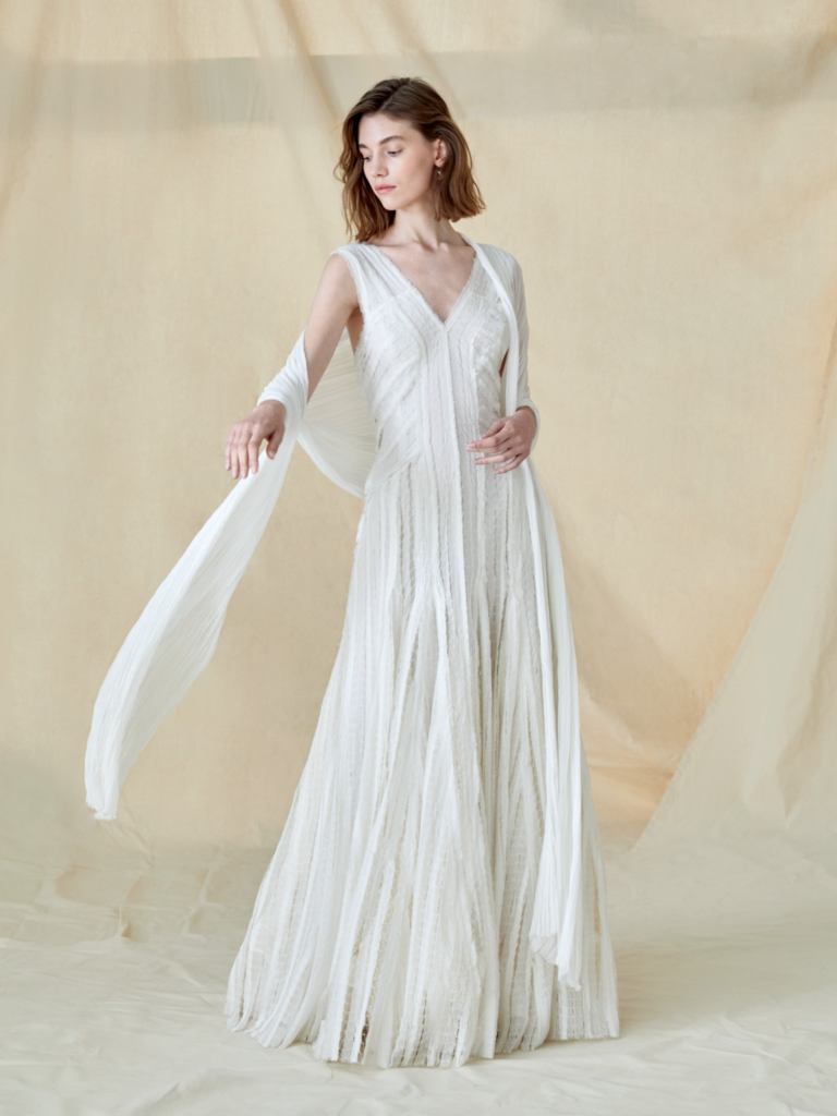 White silk sleeveless frayed finish dress for older bride