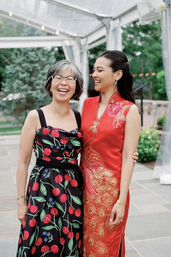 Bride in Cheongsam Posing With Mother of the Bride