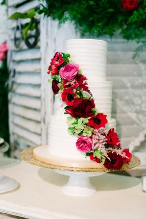 Buttercream Wedding Cake With Rich Pink Floral Cascade