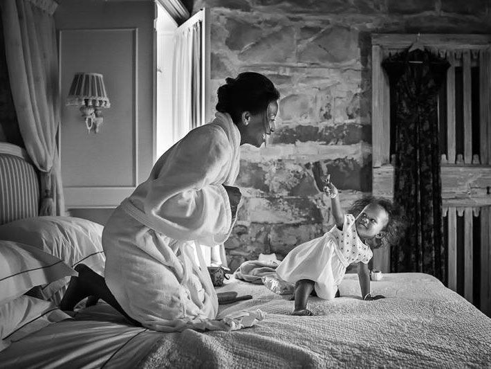 Bride and little flower girl before the wedding