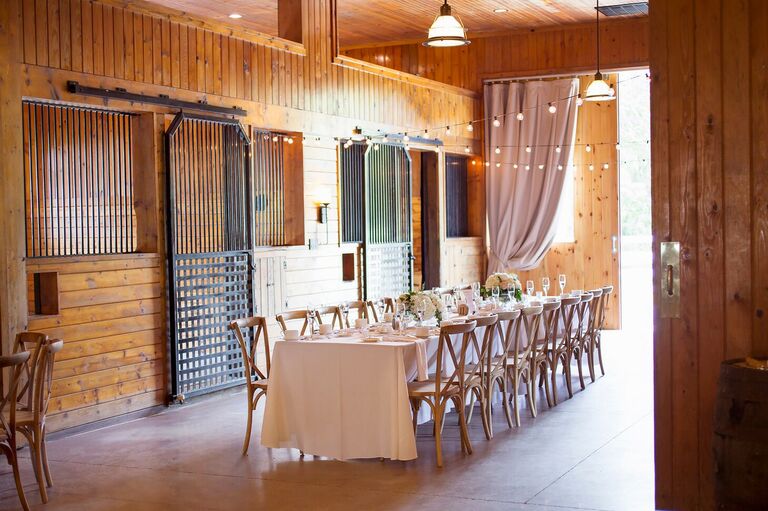 Wedding reception in rustic horse stable