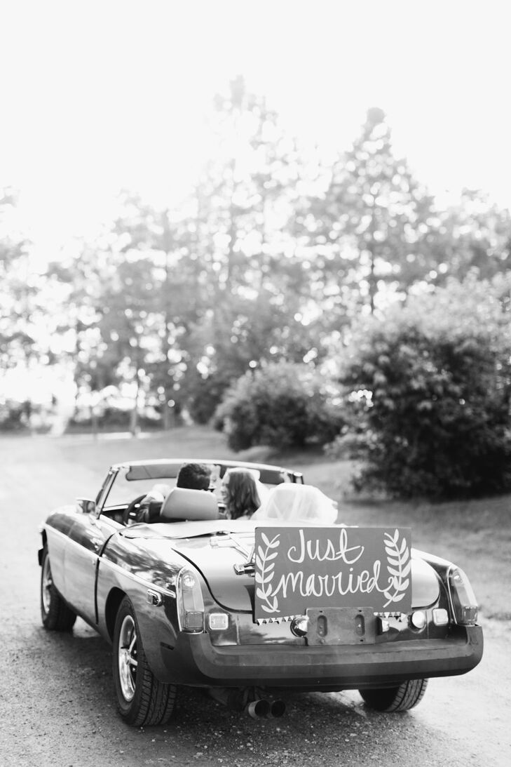 After the reception Molly and Visar drove off in a vintage convertible with a "just married" sign.